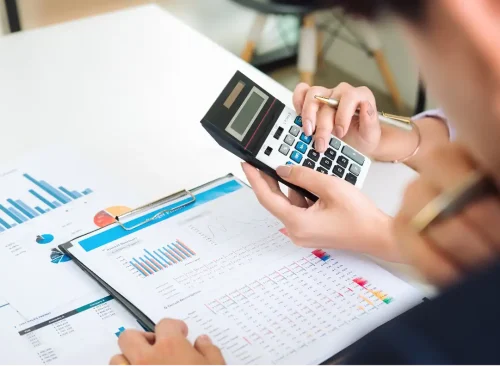 Accounts receivable analytics showing revenue reports, payer aging data, and cash flow calculations